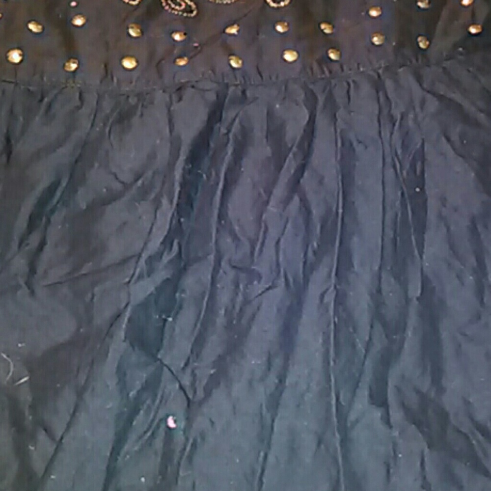 Women dress gold and black